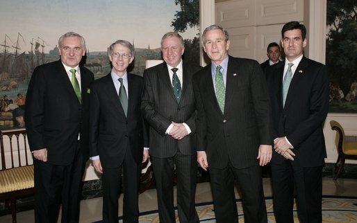 During St. Patrick's Day celebrations at the White House, President George W. Bush stands with, from left, Irish Prime Minister Bertie Ahern; British Ambassador Sir David Manning; British Secretary of State for Northern Ireland Paul Murphy; and U.S. Special Envoy for Northern Ireland Mitchell Reiss in the Diplomatic Reception Room Thursday, March 17, 2005. White House photo by Eric Draper
