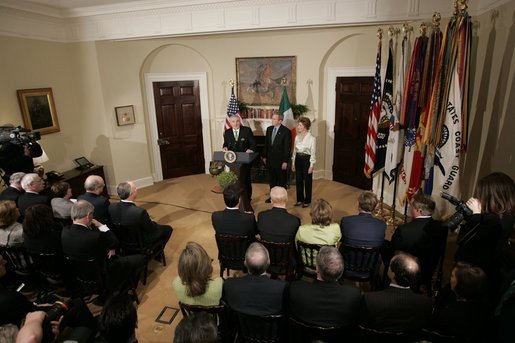 Irish Taoiseach Bertie Ahern delivers remarks before presenting President George W. Bush with the traditional bowl of shamrocks during a St. Patrick's Day Shamrock Ceremony in the Roosevelt Room Thursday, March 17, 2005. White House photo by Paul Morse