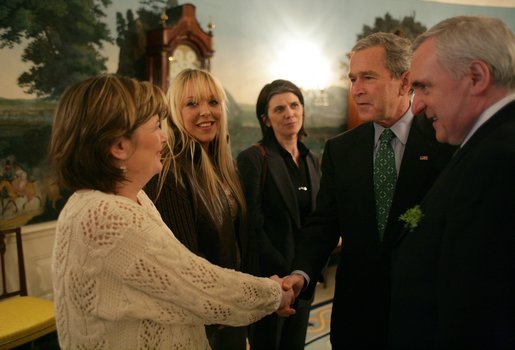 The fiancée and two sisters of Robert McCartney, a Catholic man who was killed in January, meet with President George W. Bush and Irish Prime Minister Bertie Ahern in the Diplomatic Reception Room at the White House Thursday, March 17, 2005. From left, they are: sister Paula Arnold; fiancée Bridgeen Hagans; sister Catherine McCartney; and Irish Prime Minister Bertie Ahern. White House photo by Eric Draper