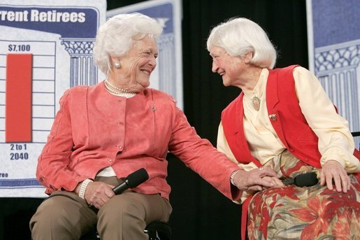 Former First Lady Barbara Bush speaks with Myrtle Campbell during a discussion on strengthening Social Security at Pensacola Junior College in Pensacola, Fla., Friday, March 18, 2005. White House photo by Eric Draper