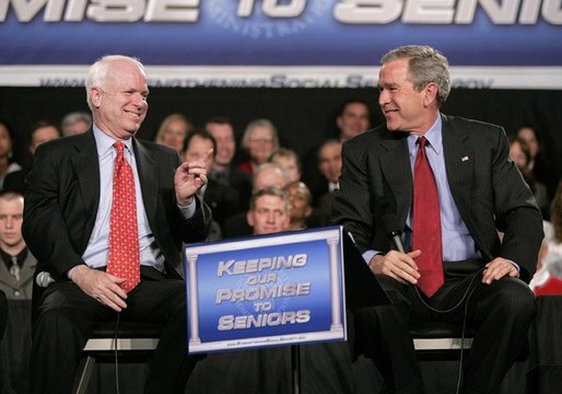 President George W. Bush and Senator John McCain, R-Ariz., participate on stage Monday, March 21, 2005, during a Conversation on Strengthening Social Security at the Wings Over the Rockies Air and Space Museum in Denver. White House photo by Eric Draper