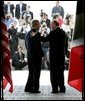 President George W. Bush greets Canadian Prime Minister Paul Martin at the beginning of meetings between the United States, Mexico and Canada at Baylor University in Waco, Texas, Wednesday, March 23, 2005. White House photo by Eric Draper