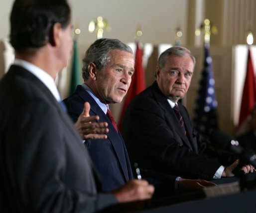 President George W. Bush speaks during March 23, 2005, trilateral meetings with Mexican President Vicente Fox, left, and Canadian Prime Minister Paul Martin, right, at Baylor University in Waco, Texas. White House photo by Krisanne Johnson White House photo by Krisanne Johnson