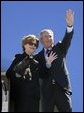 Mrs. Bush holds onto Miss Beazley Monday, March 28, 2005, as she and President George W. Bush wave goodbye upon boarding Air Force One in Waco, Texas, en route home to Washington D.C. White House photo by Eric Draper