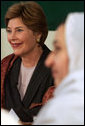 Laura Bush listens to the comments of Afghan teachers and students during a roundtable at the Women’s Teacher’s Training Institute of Kabul University in Kabul, Afghanistan, Wednesday, March 30, 2005. White House photo by Susan Sterner