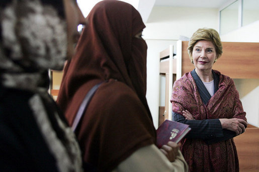 Laura Bush talks with female students in the newly built National Women’s Dormitory on the campus of Kabul University Wednesday, March 30, 2005, in Kabul, Afghanistan. The women’s dormitory was built to provide a safe place for young women to live while pursuing studies away from their families.White House photo by Susan Sterner