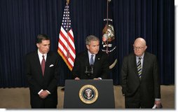 President George W. Bush, flanked by former Senator Chuck Robb, D-Va., left, and Judge Laurence Silberman, delivers a statement regarding the release Thursday, March 31, 2005, of findings by the Commission on the Intelligence Capabilities of the United States Regarding Weapons of Mass Destruction. Senator Robb and Judge Silberman are co-chairs of the commission that was established in 2004.  White House photo by Eric Draper