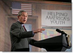 President George W. Bush addresses an estimated 600 faith-based and community practitioners and members of the local community interested in mentoring programs and prisoner re-entry issues during an appearance Friday, April 1, 2005, at Paul Public Charter School in Washington DC. The president was promoting his Helping America's Youth initiative.  White House photo by Eric Draper