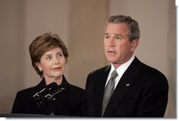 President George W. Bush gives remarks on the death of Pope John Paul II with First Lady Mrs. Laura Bush at the White House on Saturday April 2, 2005.  White House photo by Paul Morse