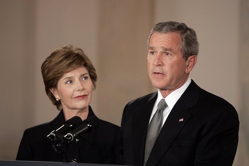 President George W. Bush gives remarks on the death of Pope John Paul II with First Lady Mrs. Laura Bush at the White House on Saturday April 2, 2005. White House photo by Paul Morse