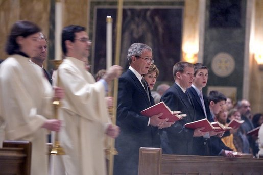President George W. Bush and Mrs. Laura Bush attend mass at the Cathedral of Saint Matthew the Apostle in Washington, DC on Saturday, April 2, 2005 in remembrance of Pope John Paul II. White House photo by Paul Morse