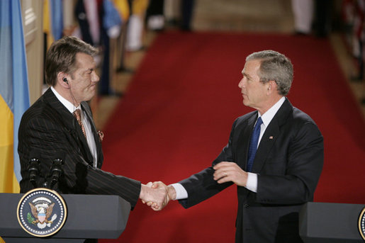 President Bush and President Yushchenko shake hands after a press availability Monday, April 4, 2005. The Ukraine president and his wife visited the White House for the day.White House photo by Paul Morse