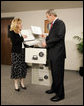 President George W. Bush tours the Treasury Agency's Bureau of Public Debt, with Director Susan Chapman, in Parkersburg, W.Va., Tuesday, April 5, 2005. White House photo by Paul Morse