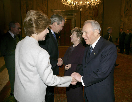 President George W. Bush and first lady Laura Bush are greeted upon their arrival to Quirinale Palace by Italy's President and first lady, Carlo and Franca Ciampi, Thursday, April 7, 2005. President and Mrs. Bush paid the courtesy visit while in Rome for the funeral of Pope John Paul II. White House photo by Eric Draper