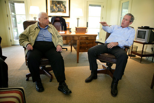 President George W. Bush emphasizes a point as he shares a moment with Israel Prime Minister Ariel Sharon during the Prime Minister's visit Monday, April 11, 2005, to the President's ranch in Crawford, Texas. White House photo by Eric Draper