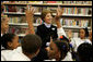 Laura Bush introduces her Scottish Terrier puppy Miss Beazley to fourth-grade students from Maury Elementary School during a visit to the Martin Luther King Jr. Memorial Library in Washington, D.C., Tuesday, April 12, 2005. White House photo by Krisanne Johnson