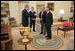 As honorary chairman of the 2005 Presidents Cup, President George W. Bush shares a moment with Cup co-captains Jack Nicklaus, center, Gary Player, right, and Tim Finchem, PGA Tour director, Wednesday, April 13, 2005, in the Oval Office. The Presidents Cup, played during non-Ryder Cup years, is scheduled for September at the Robert Trent Jones Golf Club on Lake Manassas in Prince William County, Virginia. White House photo by Paul Morse