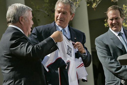 President George W. Bush jokes with New England Patriots owner Robert Kraft during a ceremony honoring the 2005 Super Bowl Champions in the Rose Garden April 13, 2005.White House photo by Eric Draper
