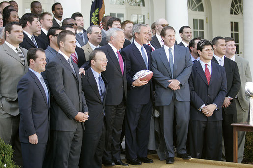 President George W. Bush poses with the New England Patriots during a ceremony honoring the 2005 Super Bowl Champions in the Rose Garden April 13, 2005. White House photo by Eric Draper