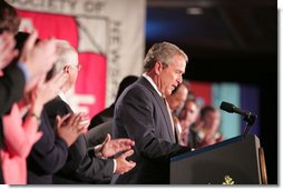 President George W. Bush receives a welcoming ovation as he arrives at the J.W. Marriott Hotel in Washington DC Thursday, April 14, 2005, to address the American Society of Newspaper Editors annual convention.  White House photo by Paul Morse