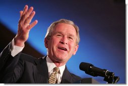 President George W. Bush acknowledges a Texas newspaperman during opening remarks in his address Thursday, April 14, 2005, to the American Society of Newspaper Editors, meeting in Washington DC.  White House photo by Paul Morse