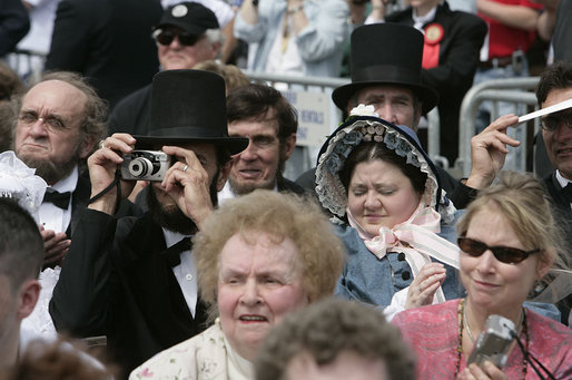 One of the many Lincoln look-alikes attending the dedication of the Abraham Lincoln Presidential Library and Museum captures a few memories for himself in Springfield, Ill., Tuesday, April 19, 2005. White House photo by Eric Draper