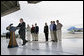 President George W. Bush delivers remarks on Earth Day Friday, April 22, 2005, at McGhee Tyson Air National Guard Base in Knoxville, Tenn. Standing behind him are, from left: Rep. John Duncan, Jr.; Senator Lamar Alexander; Senator Bill Frist; Interior Secretary Gale Norton; EPA Administrator Steve Johnson; Rep. Zach Wamp, and Rep. William Jenkins. White House photo by Eric Draper