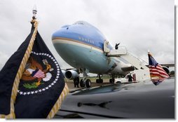 President George W. Bush waves goodbye while boarding Air Force One before departing McGhee Tyson Air National Guard Base in Knoxville en route to his ranch in Crawford, Texas, Friday, April 22, 2005.  White House photo by Eric Draper