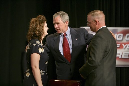  President George W. Bush greets Galveston County Employees Bea Bentley and her husband Christopher at the end of a roundtable discussion on Strengthening Social Security at the University of Texas Medical Branch in Galveston, Texas, Tuesday, April 26, 2005. White House photo by Eric Draper