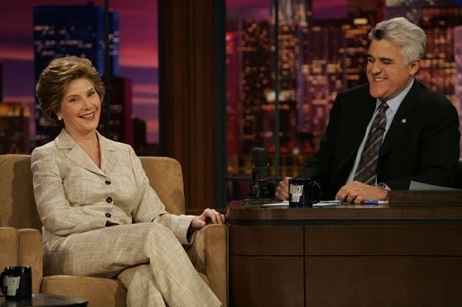 Laura Bush talks with Jay Leno of The Tonight Show during a taping of the show in Los Angeles April 26, 2005. White House photo by Krisanne Johnson