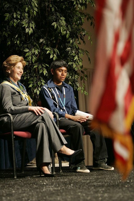 Laura Bush sits with 16-year-old Derwin Tekala, a participant in the Red Road Youth Empowerment Project, before delivering remarks at the Heard Museum in Phoenix, Ariz., April 26, 2005. Mrs. Bush discussed the role of strong family and cultural bonds in helping children resist negative social pressures. White House photo by Krisanne Johnson