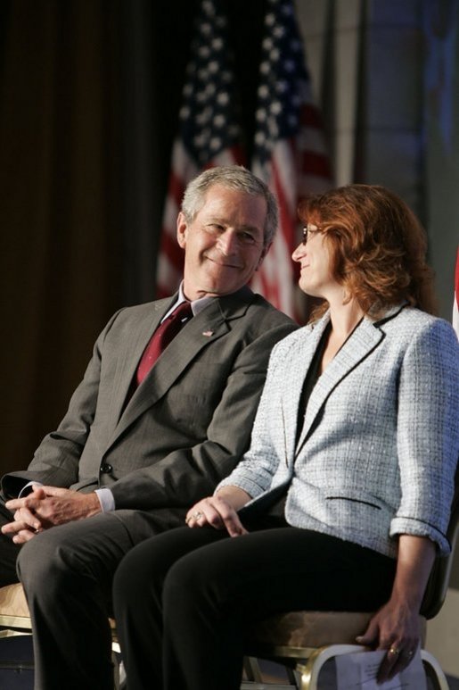President George W. Bush shares the spotlight with Marianne Sensale-Guerin, 2005 SBA National Small Business Person of the Year, during his address to the National Small Business Week Conference in Washington, D.C., Wednesday, April 27, 2005. White House photo by Paul Morse