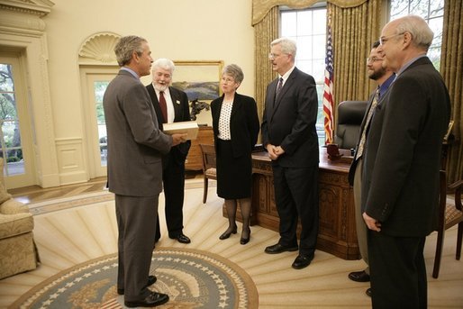 President George W. Bush talks with editors of The Papers of George Washington in the Oval Office Friday, April 29, 2005, after they presented him the latest volume, the 12th of a projected 21 volumes in the “Presidential Series” of The Papers. From left are: Ted Crackel, editor-in-chief, The Papers of George Washington; Christine Sternberg Patrick, assistant editor; Phil Chase, senior editor; John Pinheiro, former assistant editor, and Bruce Cole, chairman, National Endowment for the Humanities. White House photo by Eric Draper