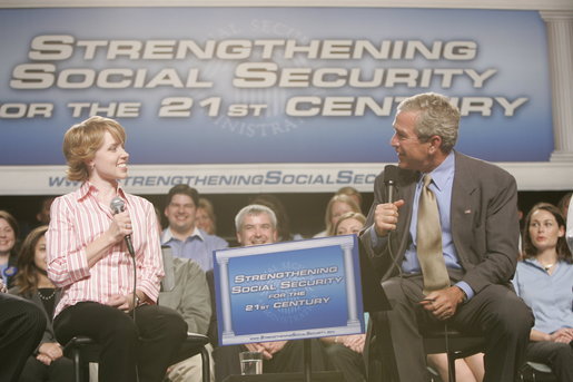 President George W. Bush talks with Colleen Rummel during a conversation on Social Security at the James Lee Community Center, Falls Church, Va., Friday, April 29, 2005. White House photo by Paul Morse