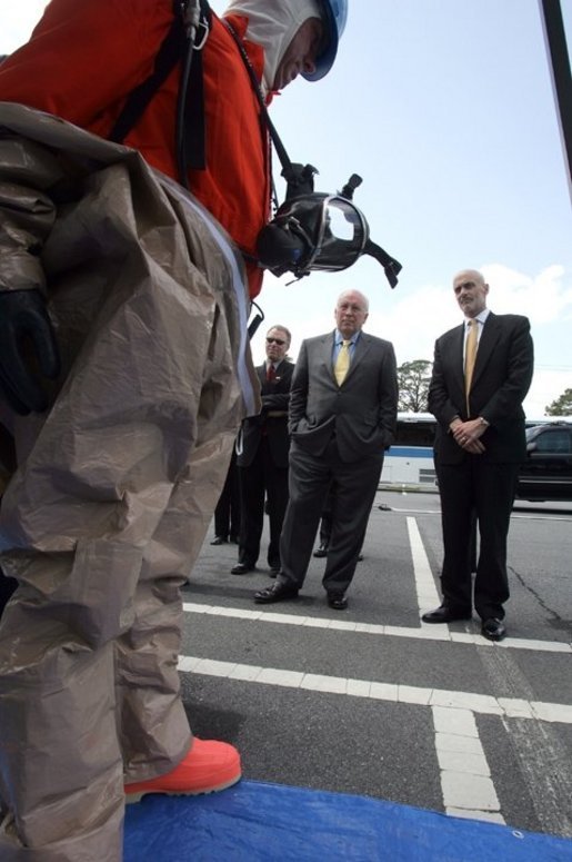 Vice President Dick Cheney and Department of Homeland Security Secretary Michael Chertoff watch a demonstration of an emergency worker donning protective gear during a visit to the Federal Law Enforcement Training Center in Glynco, Georgia, May 2, 2005. White House photo by David Bohrer