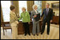 President George W. Bush and Laura Bush meet with Barbara de Marneff and Stephanie Copeland of Edith Wharton Restoration in Massachusetts, in the Oval Office Monday, May 2, 2005. The two women are two of the recipients of the 2005 Preserve America Presidential Award. White House photo by Eric Draper