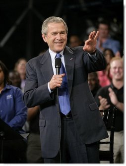 President George W. Bush waves to the audience during his introduction Tuesday, May 3, 2005, during a Conversation on Strengthening Social Security at the Nissan North America Manufacturing Plant in Canton, Miss.  White House photo by Eric Draper