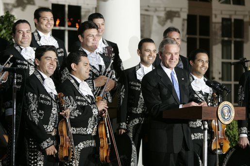 President George W. Bush delivers remarks during the White House celebration of Cinco de Mayo in the Rose Garden Wednesday, May 4, 2005. White House photo by Paul Morse