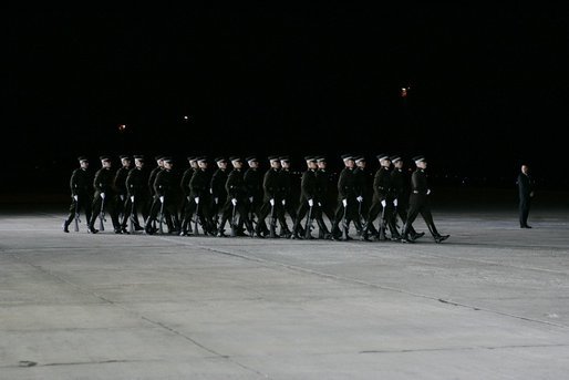 Latvian troops arrive to welcome President and Mrs. George W. Bush to Riga International Airport Friday, May 6, 2005. White House photo by Krisanne Johnson
