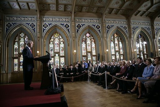 Delivering an address during the 60th anniversary week of WWII, President George W. Bush tells the story of Latvian sailors on eight freighters who disobeyed orders from a puppet government and remained at sea to help the U.S. Merchant Marines during the war at The Small Guild Hall in Riga, Latvia, Saturday, May 7, 2005. “By the end of the war, six of the Latvian ships had been sunk, and more than half the sailors had been lost,” said President Bush. “Nearly all of the survivors settled in America, and became citizens we were proud to call our own.” White House photo by Krisanne Johnson