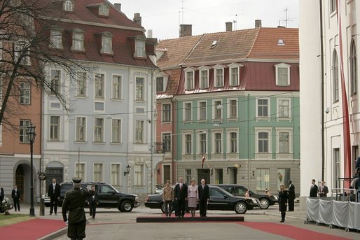 President George W. Bush and Laura Bush participate in a ceremony with Latvia's President Vaira Vike-Freiberga and her husband Imants Freibergs at Riga Castle, Riga, May 7, 2005. White House photo by Paul Morse