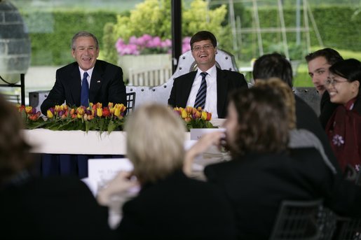President George W. Bush and Prime Minister Jan Peter Balkenende of The Netherlands, smile as they answer questions during a youth roundtable Sunday, May 8, 2005, in Valkenburg, Netherlands. White House photo by Eric Draper