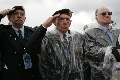 Veterans of World War II salute President George W. Bush Sunday, May 8, 2005, during a celebration at the Netherlands American Cemetery in Margraten, Netherlands, honoring those who served 60 years ago. White House photo by Krisanne Johnson