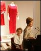 With former First Lady Nancy Reagan looking on, Laura Bush addresses the opening of The Heart Truth’s First Ladies Red Dress Collection Thursday, May 12, 2005, at the John F. Kennedy Center for the Performing Arts in Washington D.C. Mrs. Bush, the ambassador for The Heart Truth, wore her red Carolina Herrera suit to the Bolshoi Theater in Moscow and to The Heart Truth’s Red Dress Collection Fashion Show 2005 in New York City. White House photo by Krisanne Johnson
