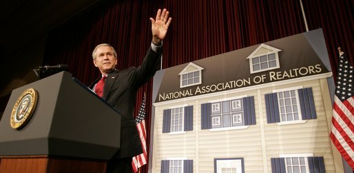 President George W. Bush waves as he arrives on stage Friday, May 13, 2005, at the Marriott Wardman Park Hotel in Washington, D.C., where he addressed the National Association of Realtors. White House photo by Paul Morse