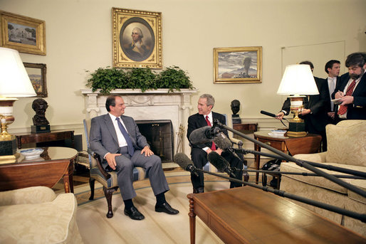 President George W. Bush and Prime Minister Kostas Karamanlis of Greece meet with the press in the Oval Office Friday, May 20, 2005. White House photo by Eric Draper