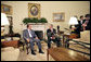 President George W. Bush and Prime Minister Kostas Karamanlis of Greece meet with the press in the Oval Office Friday, May 20, 2005. White House photo by Eric Draper