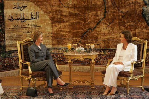 Laura Bush meets with Suzanne Mubarak, wife of Egyptian President Hosni Mubarek, at Ittihadiyya Palace in Cairo, Egypt, before spending the day together visiting an Egyptian girls school and taping a segment of children’s television program “Alam Simsim” Monday, May 23, 2005. White House photo by Krisanne Johnson