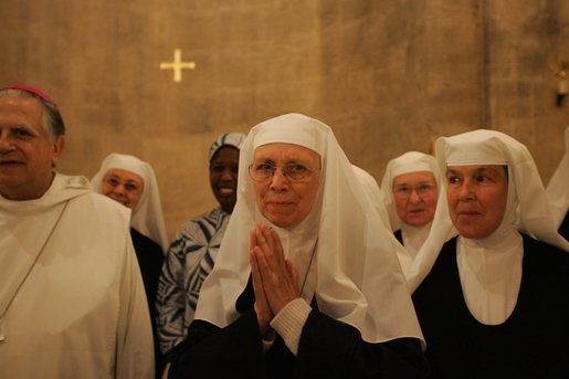 Benedictine nuns of the Church of the Resurrection at Abu Ghosh sing Psalm 150 in Hebrew during Laura Bush’s tour of monastery in Abu Ghosh Israel, Monday, May 23, 2005. White House photo by Krisanne Johnson