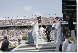 After addressing the Midshipmen and their families, President George W. Bush greets each graduate as they receive their diplomas during the U.S. Naval Academy graduation in Annapolis, Md., Friday, May 27, 2005.  White House photo by Paul Morse